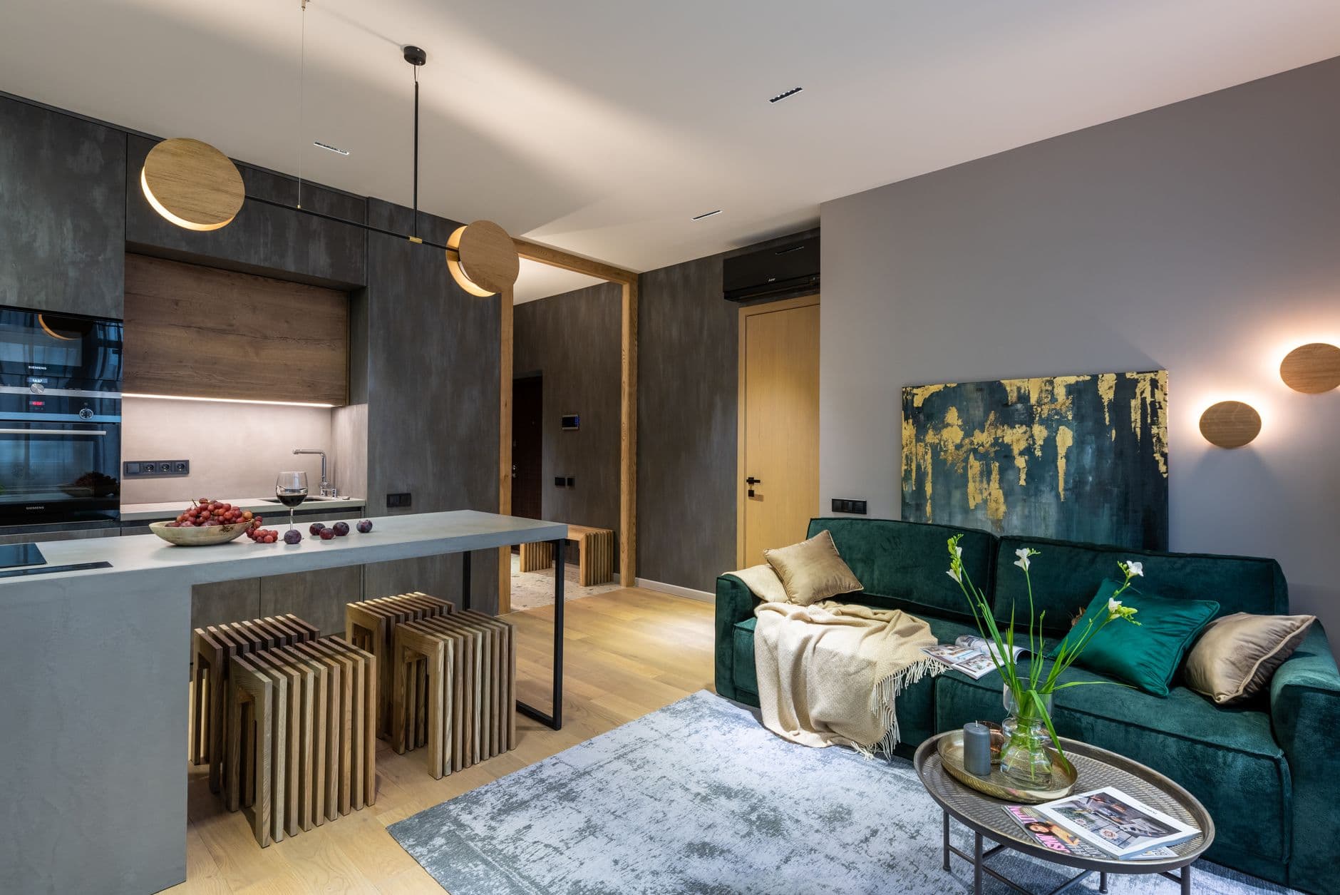 A modern open-plan living space with warm, automated evening lighting