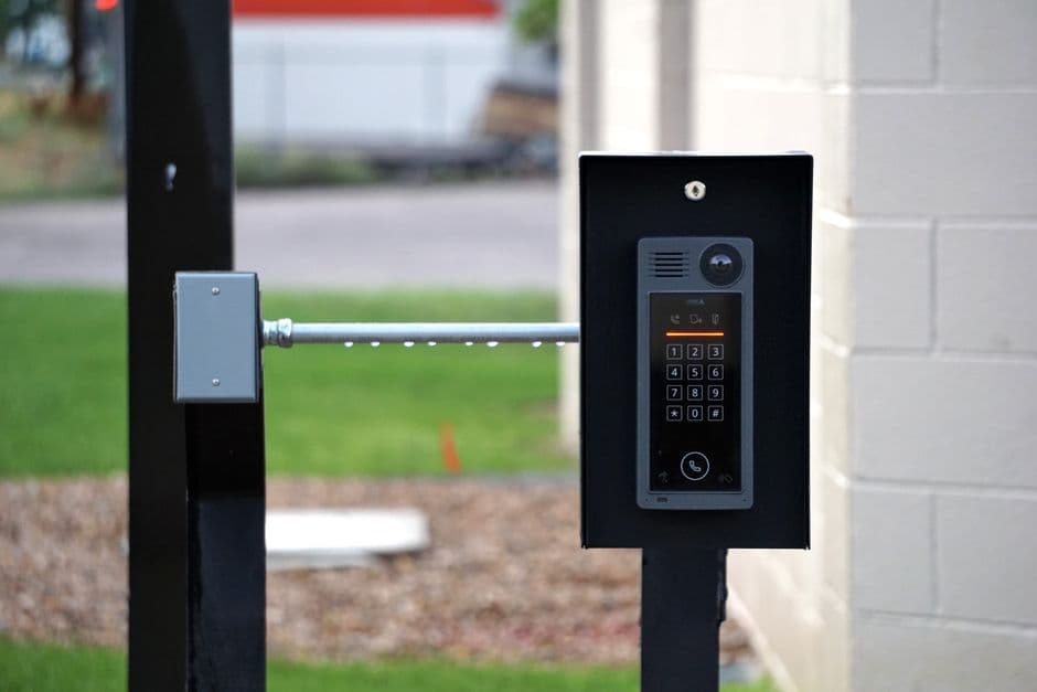 A modern video intercom at a residential entrance