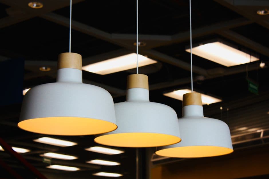 Pendant lights glowing warmly in a modern interior at night